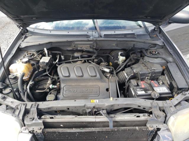 Photo 12 from auction – 2004 FORD ESCAPE LIM with VIN 1FMCU94174KA56046