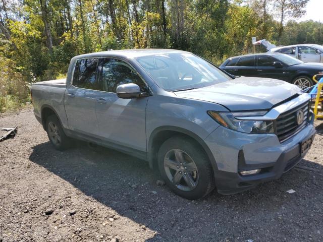 Photo 4 from auction – 2023 HONDA RIDGELINE with VIN 5FPYK3F75PB502153