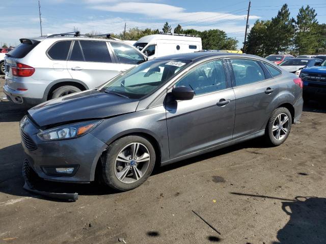 FORD FOCUS SE 2018 with VIN 1FADP3F20JL300859 - Photo from auction