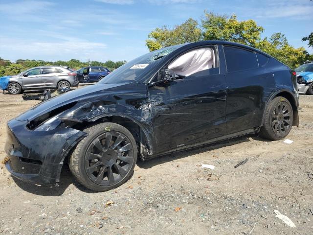 TESLA MODEL Y 2023 with VIN 7SAYGDEE4PF691672 - Photo from auction