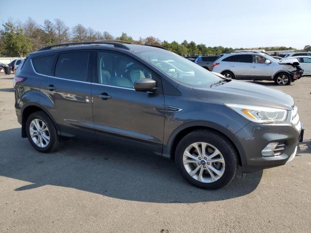 Photo 4 from auction – 2018 FORD ESCAPE SEL with VIN 1FMCU9HD8JUB93209