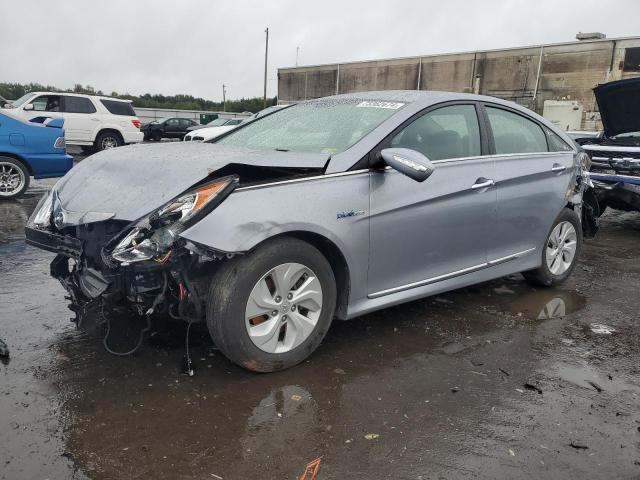 HYUNDAI SONATA HYB 2015 with VIN KMHEC4A41FA130017 - Photo from auction