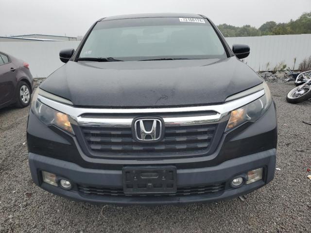 Photo 5 from auction – 2018 HONDA RIDGELINE with VIN 5FPYK3F50JB004593
