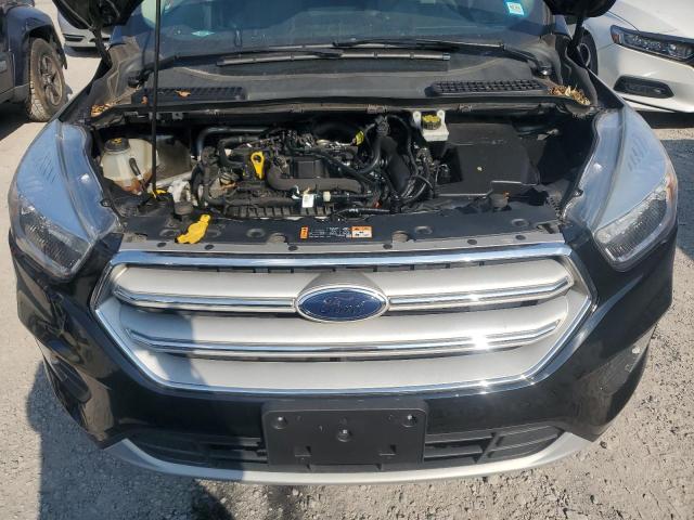 Photo 12 from auction – 2018 FORD ESCAPE SE with VIN 1FMCU9GD6JUB94635