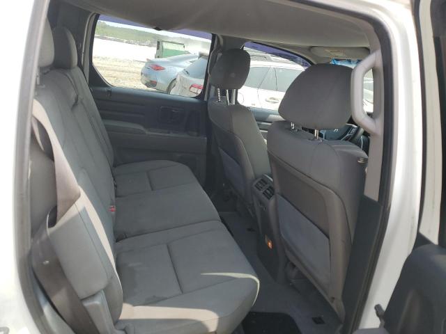 Photo 10 from auction – 2010 HONDA RIDGELINE with VIN 5FPYK1F27AB013883