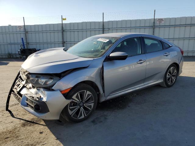 HONDA CIVIC EX 2017 with VIN 2HGFC1F30HH659102 - Photo from auction