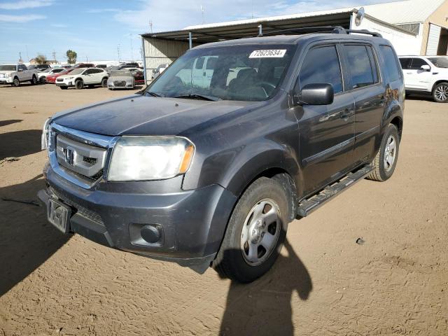 HONDA PILOT LX 2011 with VIN 5FNYF4H25BB063615 - Photo from auction