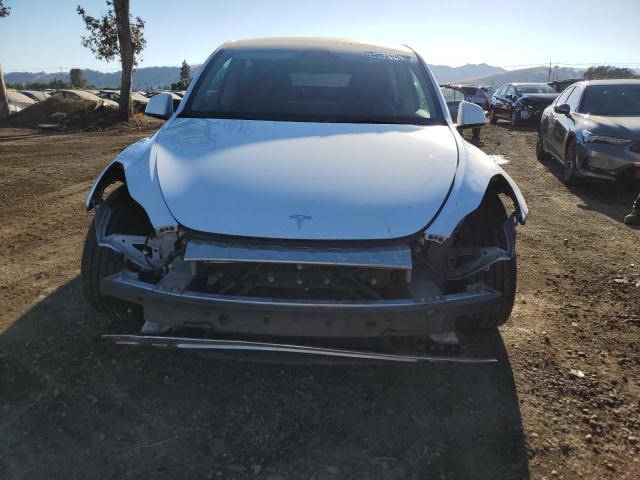 Снимка 5 от търг – 2023 TESLA MODEL Y с VIN 7SAYGAEE3PF970884