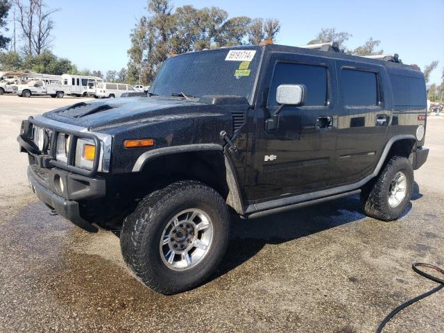 HUMMER H2 2003 with VIN 5GRGN23U73H120330 - Photo from auction
