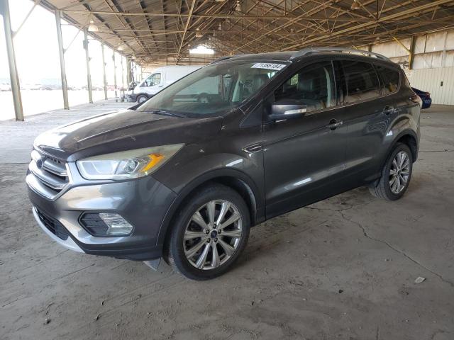 FORD ESCAPE TIT 2017 with VIN 1FMCU0J98HUD87332 - Photo from auction