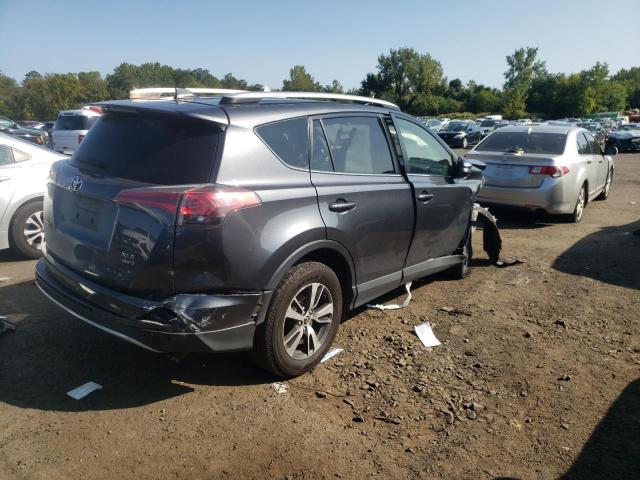 Photo 3 from auction – 2016 TOYOTA RAV4 XLE with VIN JTMRFREV1GD176721