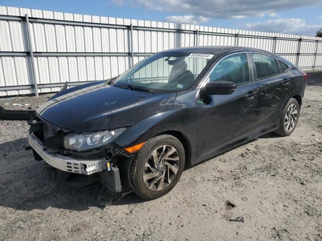 HONDA CIVIC EX 2018 with VIN 2HGFC2F74JH604148 - Photo from auction