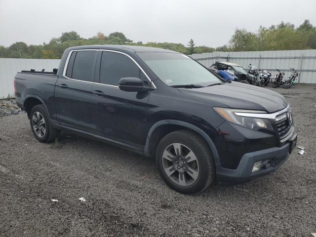 Photo 4 from auction – 2018 HONDA RIDGELINE with VIN 5FPYK3F50JB004593