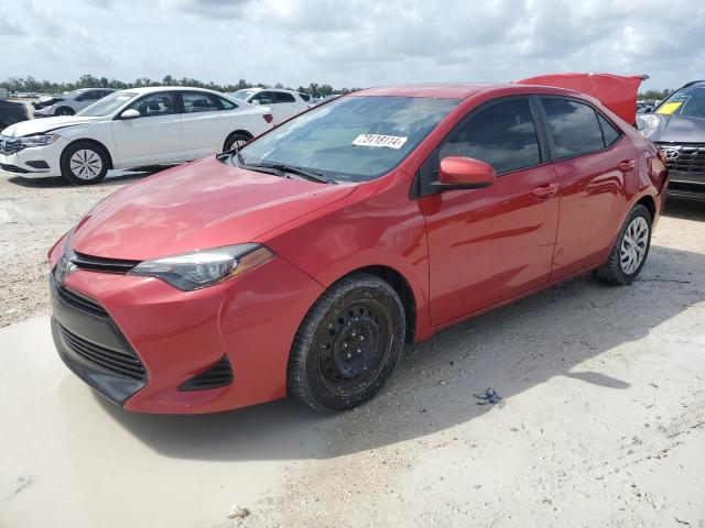 TOYOTA COROLLA L 2019 with VIN 2T1BURHE3KC218489 - Photo from auction