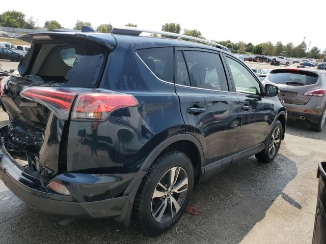 Photo 3 from auction – 2017 TOYOTA RAV4 XLE with VIN JTMWFREV3HD098978