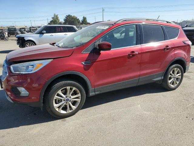 FORD ESCAPE SE 2018 with VIN 1FMCU9GD0JUA30992 - Photo from auction