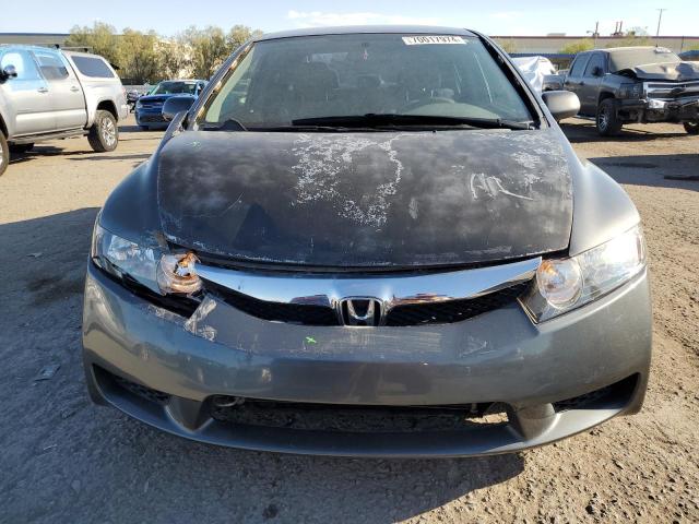 Photo 5 from auction – 2011 HONDA CIVIC LX with VIN 19XFA1F5XBE049037