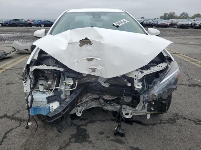 Photo 5 from auction – 2017 TOYOTA COROLLA L with VIN 2T1BURHEXHC883897