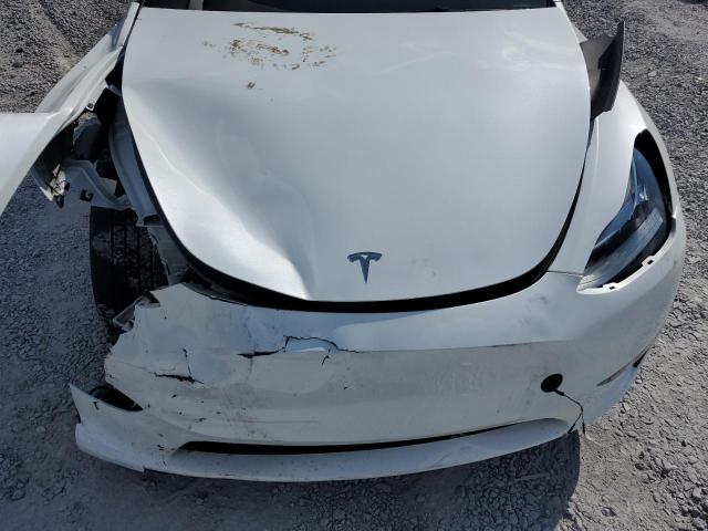 Photo 11 from auction – 2023 TESLA MODEL Y with VIN 7SAYGDEE8PA080752