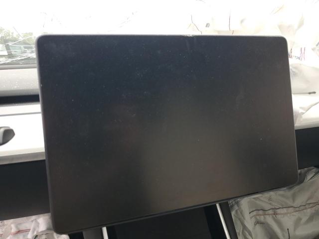 Photo 9 from auction – 2021 TESLA MODEL Y with VIN 5YJYGDEFXMF099016