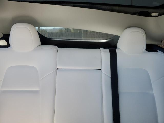 Photo 10 from auction – 2022 TESLA MODEL Y with VIN 7SAYGAEE8NF570333