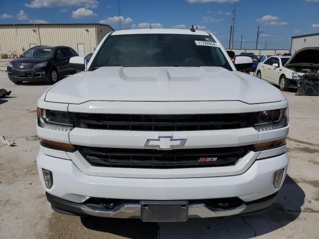 Photo 5 from auction – 2018 CHEVROLET SILVERADO with VIN 3GCUKREC5JG138360