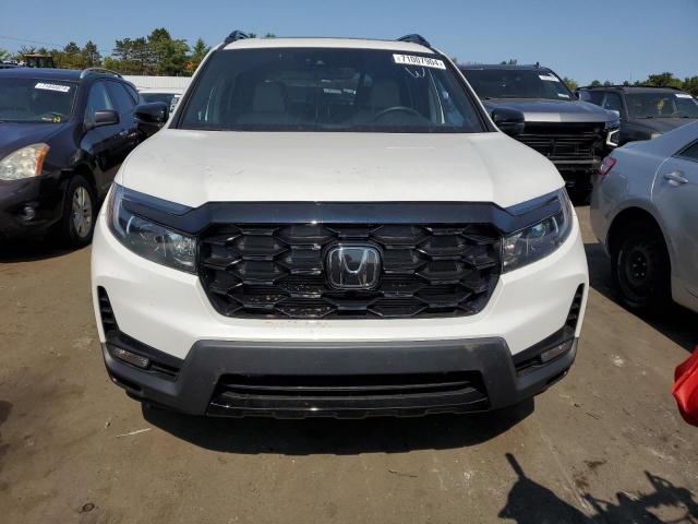 Photo 5 from auction – 2022 HONDA PASSPORT E with VIN 5FNYF8H05NB017079