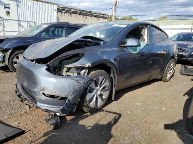 TESLA MODEL Y 2023 with VIN 7SAYGDEE7PA037276 - Photo from auction