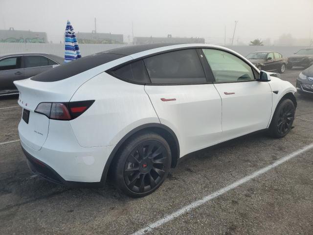 Photo 3 from auction – 2023 TESLA MODEL Y with VIN 7SAYGDEEXPA130244