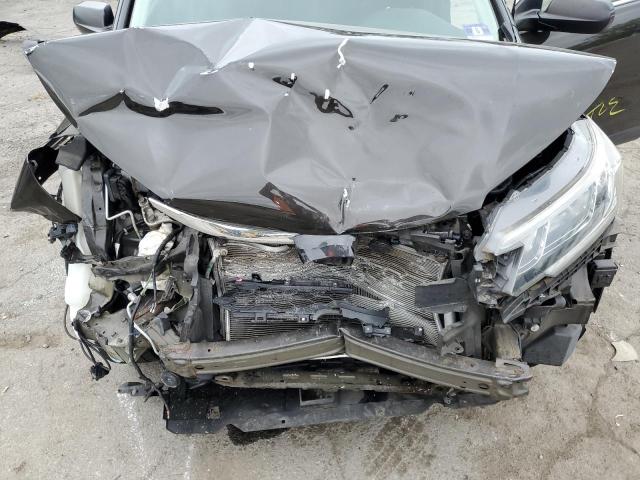 Photo 12 from auction – 2015 HONDA CR-V LX with VIN 5J6RM4H39FL107888