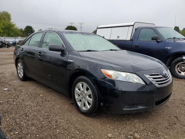 Photo 4 from auction – 2007 TOYOTA CAMRY HYBR with VIN JTNBB46K973036874