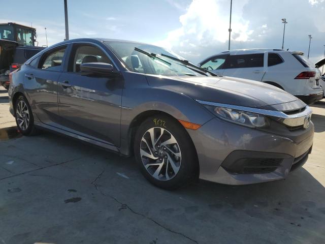 Photo 4 from auction – 2018 HONDA CIVIC EX with VIN 2HGFC2F73JH595653