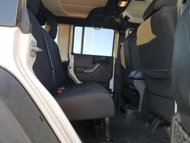 Photo 11 from auction – 2014 JEEP WRANGLER U with VIN 1C4BJWDG2EL313136