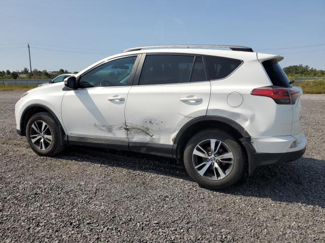 Photo 2 from auction – 2018 TOYOTA RAV4 LE with VIN 2T3ZFREVXJW498655