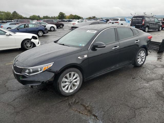 KIA OPTIMA EX 2016 with VIN 5XXGU4L31GG111990 - Photo from auction