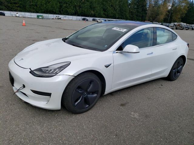TESLA MODEL 3 2018 with VIN 5YJ3E1EAXJF041177 - Photo from auction