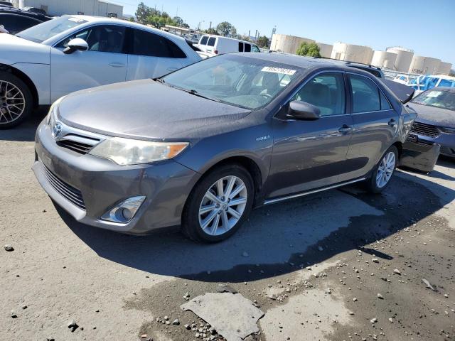 TOYOTA CAMRY HYBR 2014 with VIN 4T1BD1FK3EU117594 - Photo from auction
