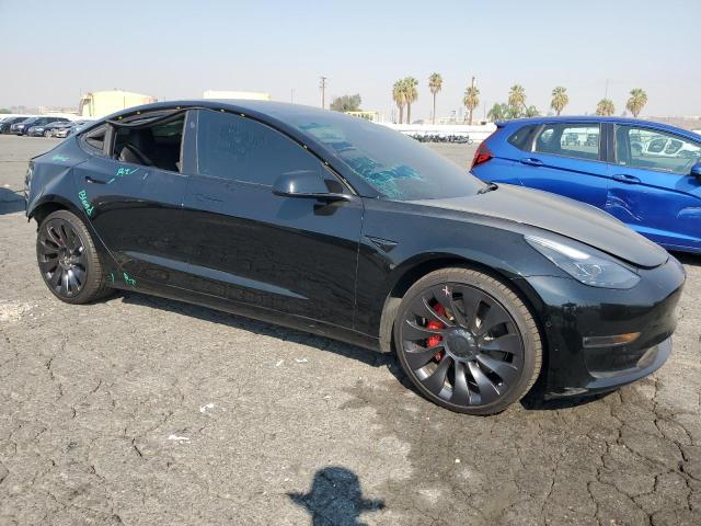 Photo 4 from auction – 2022 TESLA MODEL 3 with VIN 5YJ3E1EC4NF209306