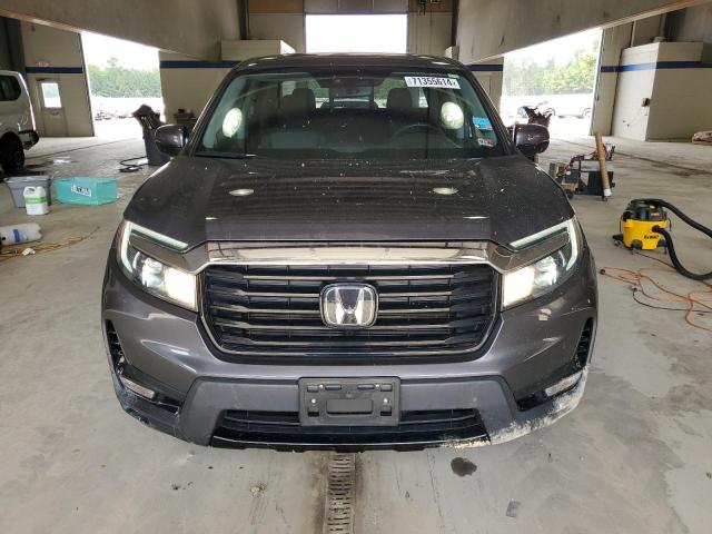 Photo 5 from auction – 2023 HONDA RIDGELINE with VIN 5FPYK3F70PB003308