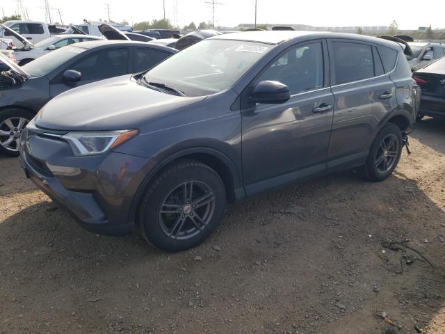 TOYOTA RAV4 LE 2018 with VIN 2T3BFREV6JW713711 - Photo from auction