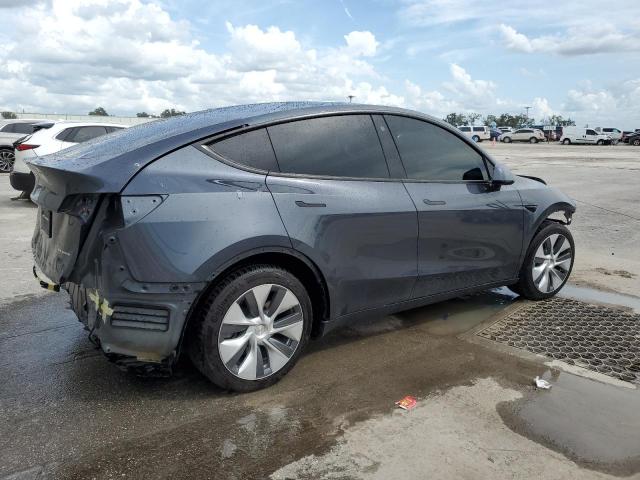 Photo 3 from auction – 2023 TESLA MODEL Y with VIN 7SAYGDEE1PA037239