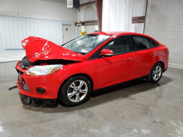 FORD FOCUS SE 2014 with VIN 1FADP3F21EL389220 - Photo from auction