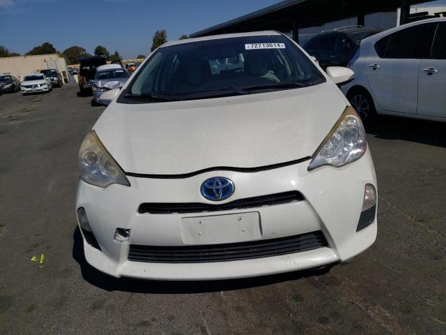 Photo 5 from auction – 2014 TOYOTA PRIUS C with VIN JTDKDTB30E1559653