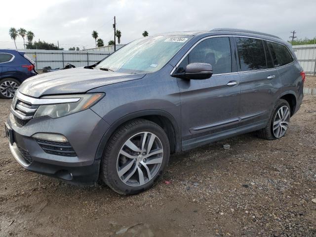Photo 1 from auction – 2016 HONDA PILOT TOUR with VIN 5FNYF5H99GB027937
