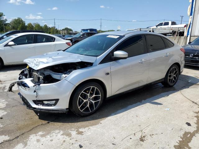 FORD FOCUS SE 2018 with VIN 1FADP3FE9JL301177 - Photo from auction