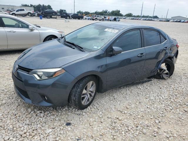 TOYOTA COROLLA EC 2014 with VIN 5YFBPRHE7EP069211 - Photo from auction