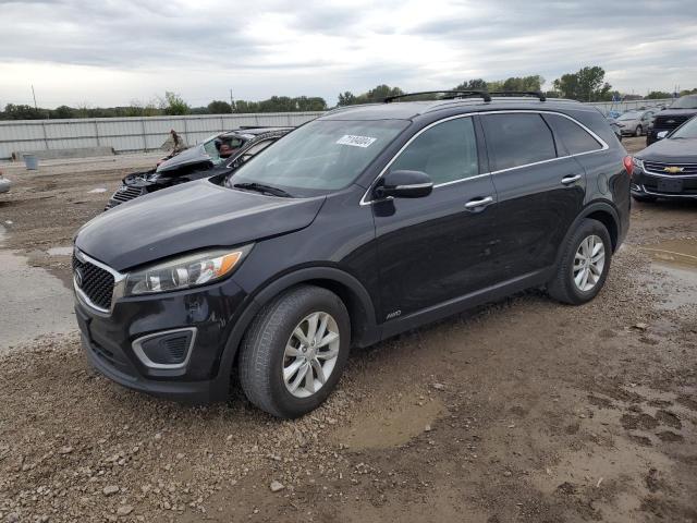 KIA SORENTO LX 2016 with VIN 5XYPGDA33GG060109 - Photo from auction