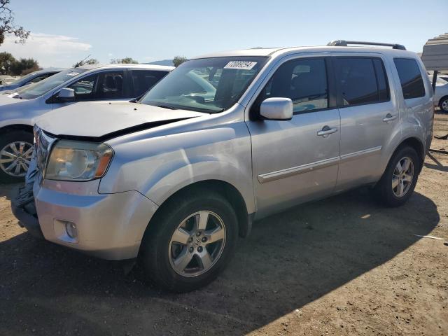 HONDA PILOT EXLN 2011 with VIN 5FNYF4H76BB018548 - Photo from auction