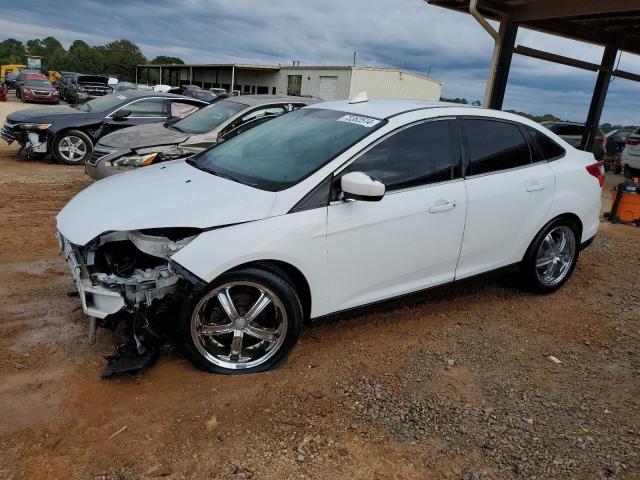 FORD FOCUS SE 2012 with VIN 1FAHP3F23CL352698 - Photo from auction