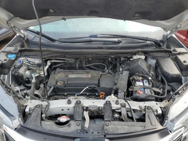 Photo 11 from auction – 2015 HONDA CR-V LX with VIN 2HKRM4H30FH647558